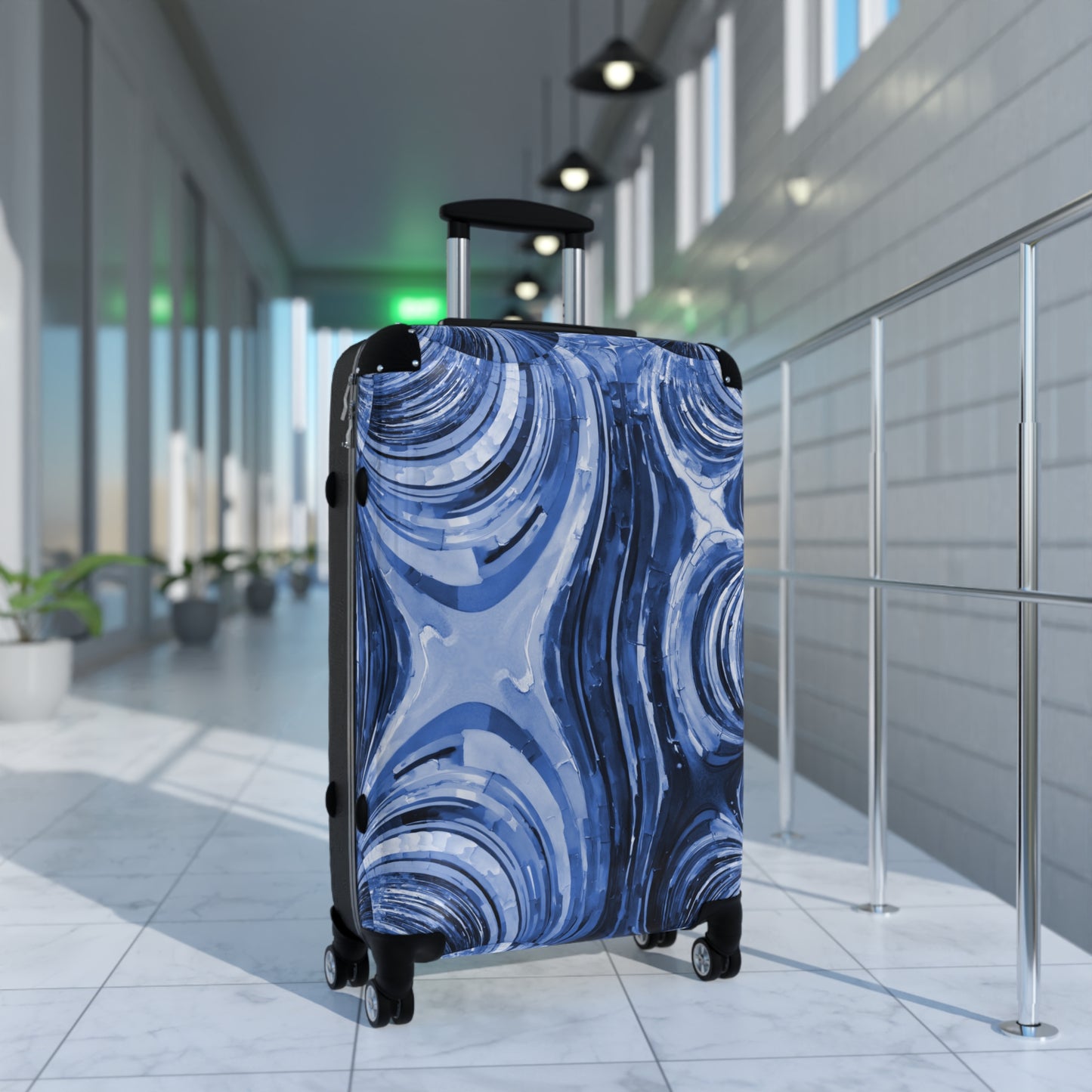 Uzi Spiral Deep Blue Medium Suitcase with built in lock, 4 double-wheels, telescopic handle, and ABS back hard-shell