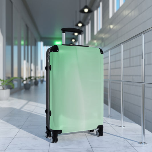 Mint Fade Medium Suitcase with built in lock, 4 double-wheels, telescopic handle, and ABS back hard-shell