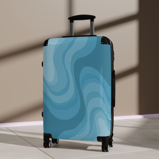 Sky Blue Wavey Medium Suitcase with built in lock, 4 double-wheels, telescopic handle, and ABS back hard-shell