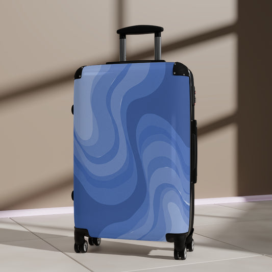 Deep Blue Wavey Medium Suitcase with built in lock, 4 double-wheels, telescopic handle, and ABS back hard-shell
