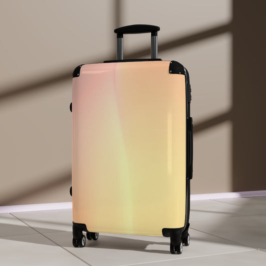 Hot Peach Fade Medium Suitcase with built in lock, 4 double-wheels, telescopic handle, and ABS back hard-shell