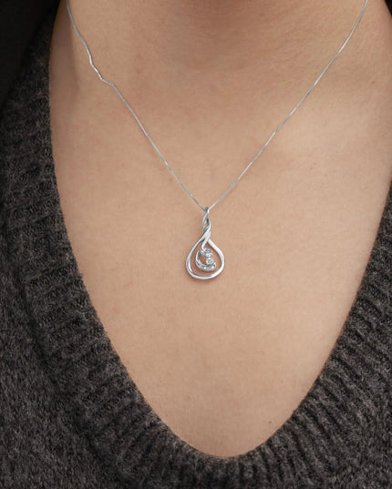 Espira 10K White Gold 1/8 cttw Round Cut Diamond Layered Spiral Pendant Necklace (I-J, I1-I2)