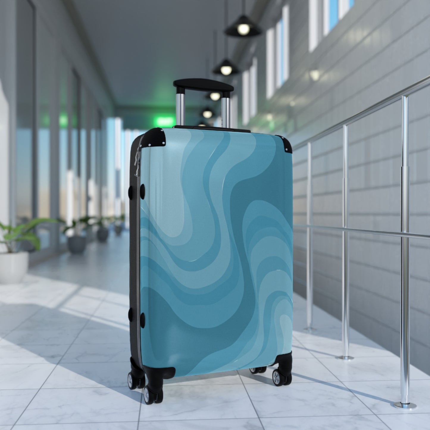 Sky Blue Wavey Medium Suitcase with built in lock, 4 double-wheels, telescopic handle, and ABS back hard-shell