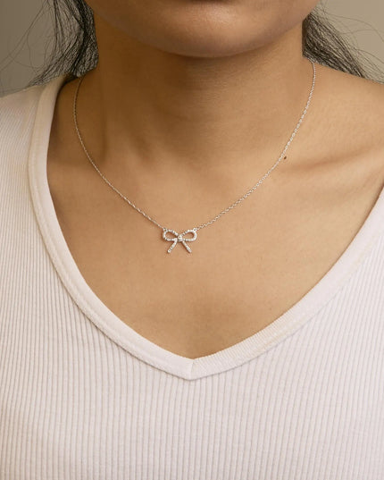 .925 Sterling Silver Diamond Accent Ribbon Bow Knot Pendant Necklace (J-K Color, I2-I3 Clarity) - 18" Inches