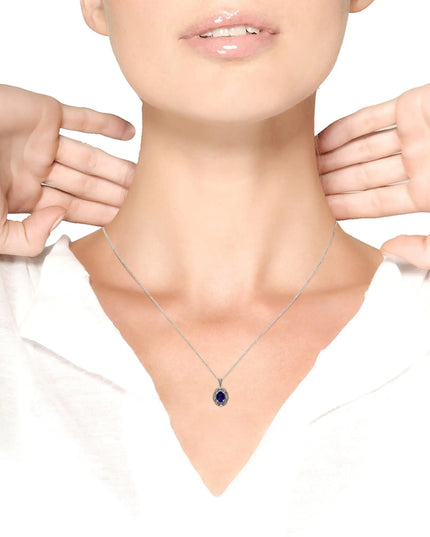 .925 Sterling Silver Diamond Accent and 9x7mm Purple Oval Amethyst Gemstone Pendant 18" Necklace (I-J Color, I1-I2 Clarity)