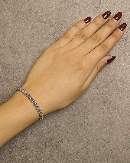 .925 Sterling Silver 1/4 Cttw Diamond 7" Open Circle Wheel Link Tennis Bracelet (I-J Color, I2-I3 Clarity)