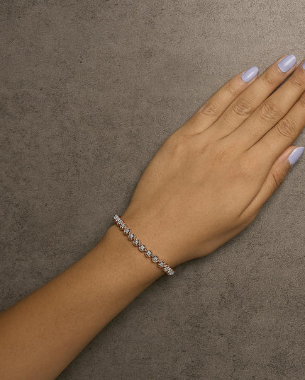.925 Sterling Silver 1/10 Cttw Diamond Open Circle Beaded Wheel Link Tennis Bracelet (I-J Color, I3 Clarity) - 7.25"
